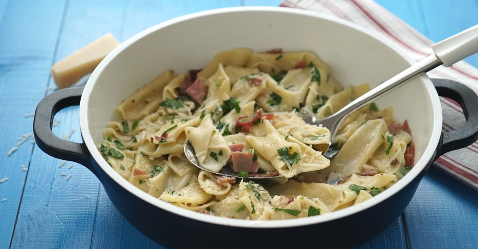 Cappelletti Filled with Cream Cheese and Prosciutto in Wild Truffle Sauce, Topped with Parmesan