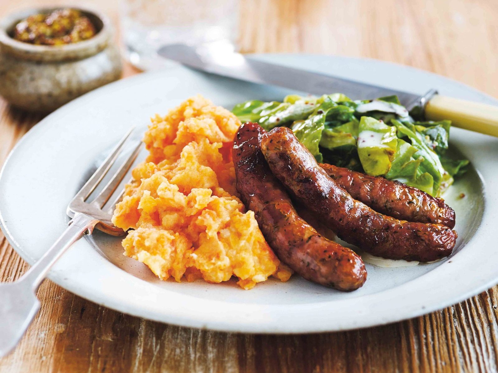 Mangalica Sausages on Mashed Potatoes with Dijon Mustard